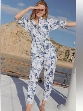 Anthropologie White Jumpsuit with Blue Floral Print